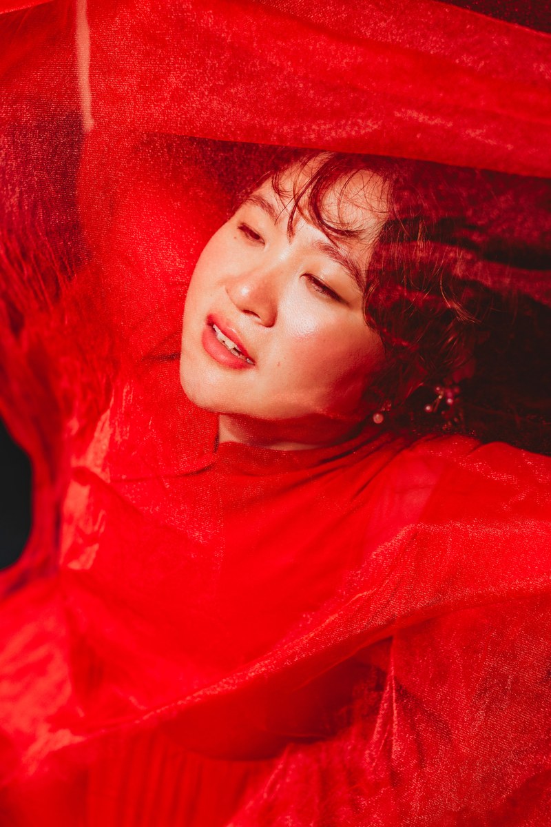 Editorial portrait, red fabric