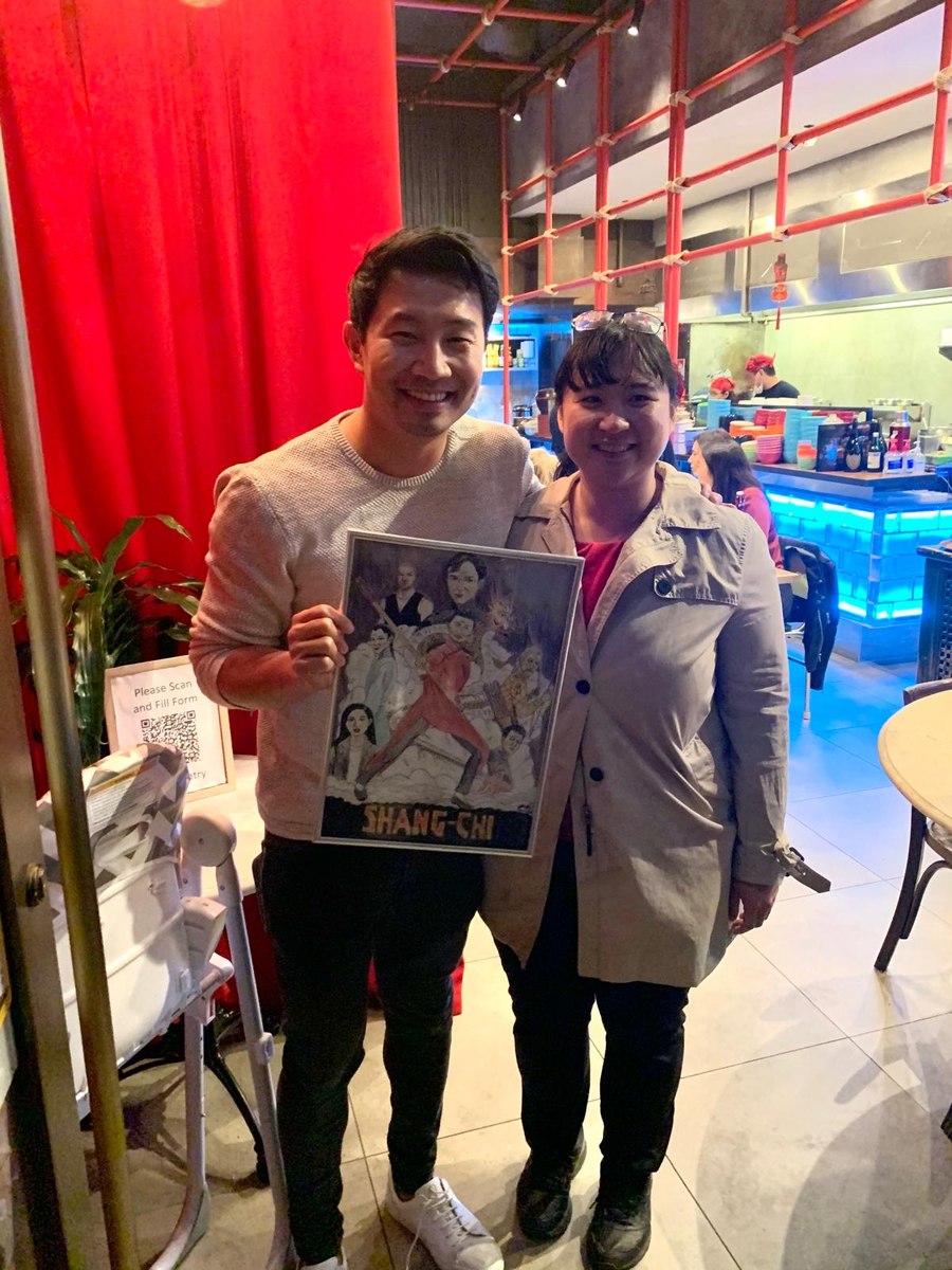Joanne Chang with Simu Liu on the set of Shang-Chi